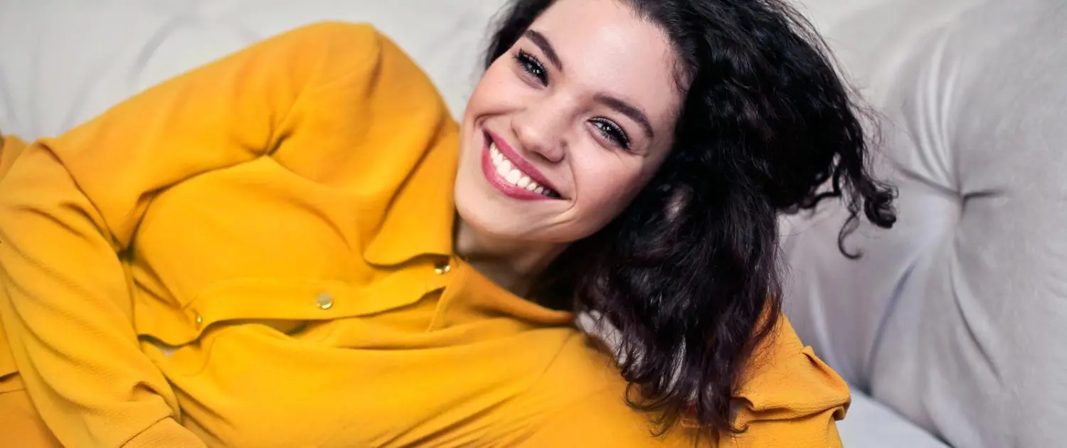 woman-smiling-yellow woman-smiling-yellow